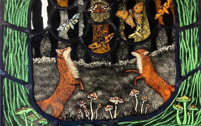 Moth Chasing Foxes handmade stained glass panel by Christine Saunders