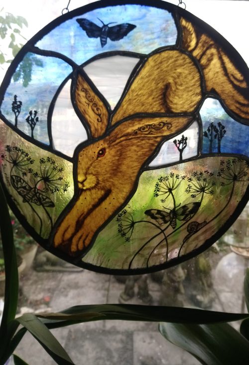 leaping hare and moths